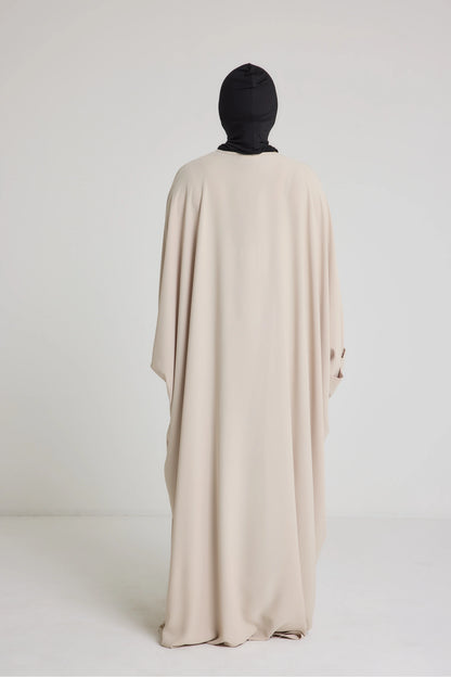 Robe Nour - large et manche large avec bouton