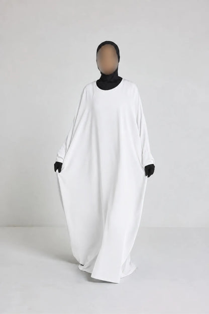 Robe Nour - large et manche large avec bouton blanc